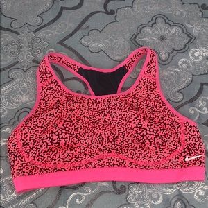 Hot pink and black Nike sports bra